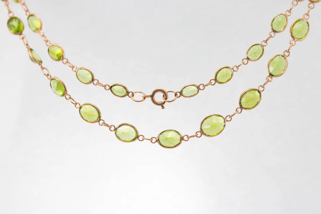 Bold emerald necklace-9ct Rose Gold Peridot Graduated Line Necklace