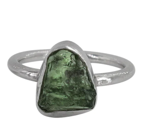 Swirled design ring-Sterling silver with rhodium, 10x13mm moldavite stone ring with 2mm band, colour and size may vary.