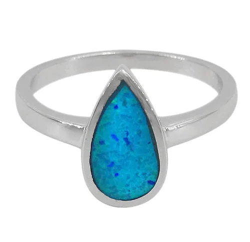 Sterling silver with rhodium, 13x8mm emulated opal ring with 2mm band.